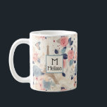 Flowers and Eiffel Tower Paris Pattern Monogram Coffee Mug<br><div class="desc">A mug with a lovely French themed pattern. Pretty flowers and an Eiffel tower and butterflies. Colors include pink,  blue,  peach and cream.</div>