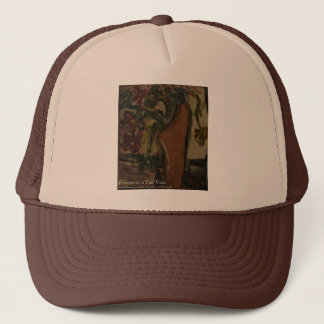flowers in a tan vase trucker hat