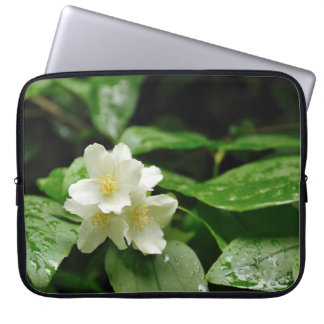 flowers of jasmin in spring garden laptop sleeve