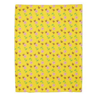 flowers with butterflies on a yellow background duvet cover
