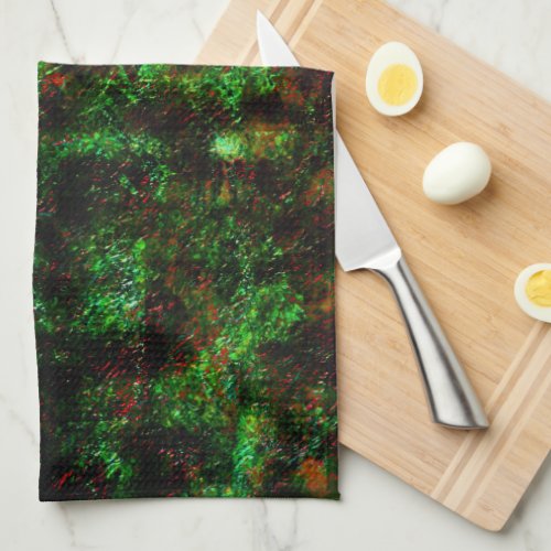 Fluctuation of dark spots on showy rough green kitchen towel