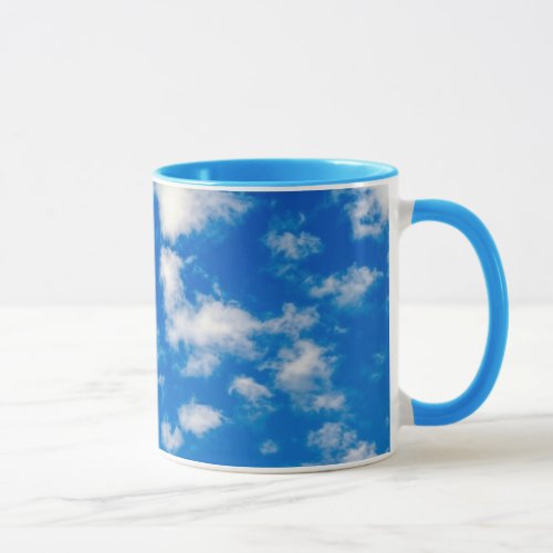 Fluffy White Clouds in a Blue Sky Mug