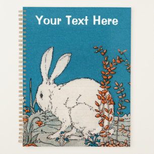 Fluffy White Rabbit Sitting in Pretty Flowers Blue Planner