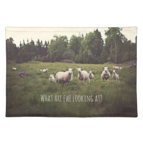 Fluffy white sheep  lamb in green pasture cloth placemat