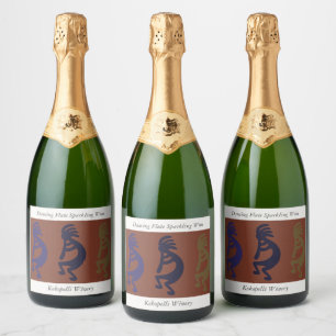 Flute Playing Kokopelli Figures on Rust Red Champa Sparkling Wine Label