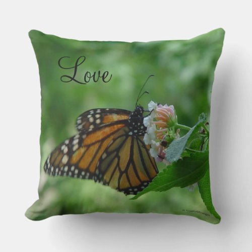 Fluttering Monarch Butterfly on Flower Pillow