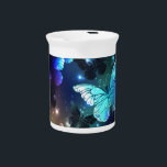 Fluttering Night Butterfly Beverage Pitcher<br><div class="desc">Fabulous,  glowing,  blue and yellow,  night butterfly on dark background.</div>