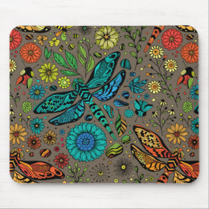 Fly, fly dragonfly on brown mouse pad