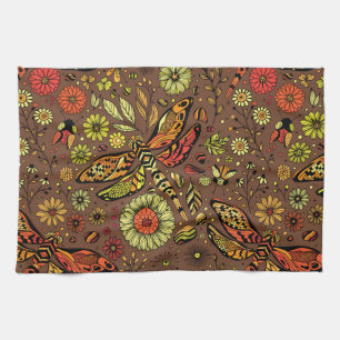 Fly, fly dragonfly on cinnamon brown kitchen towel