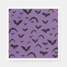 Flying bats on purple
