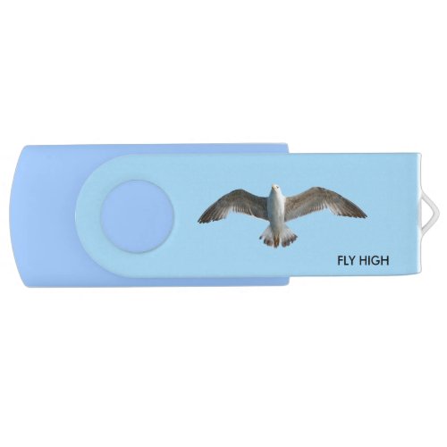 Flying bird on light blue flash drive