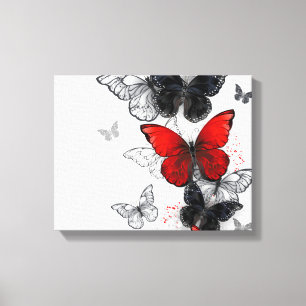 Flying Black and Red Morpho Butterflies Canvas Print