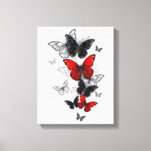 Flying Black and Red Morpho Butterflies Canvas Print