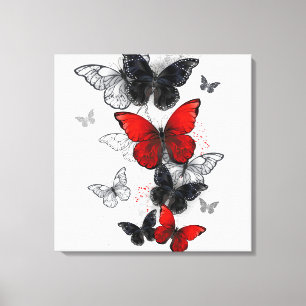 Flying Black and Red Morpho Butterflies Canvas Print