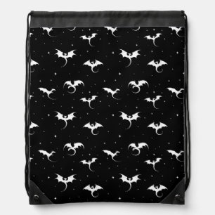 Flying dragons and stars on black background drawstring bag