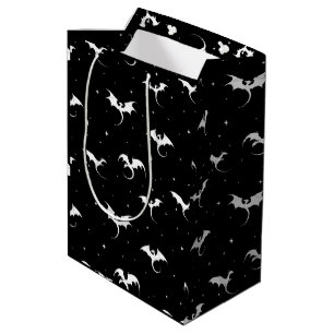 Flying dragons and stars on black background medium gift bag