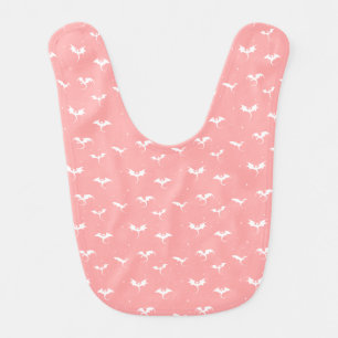 Flying dragons and stars on pink background baby bib