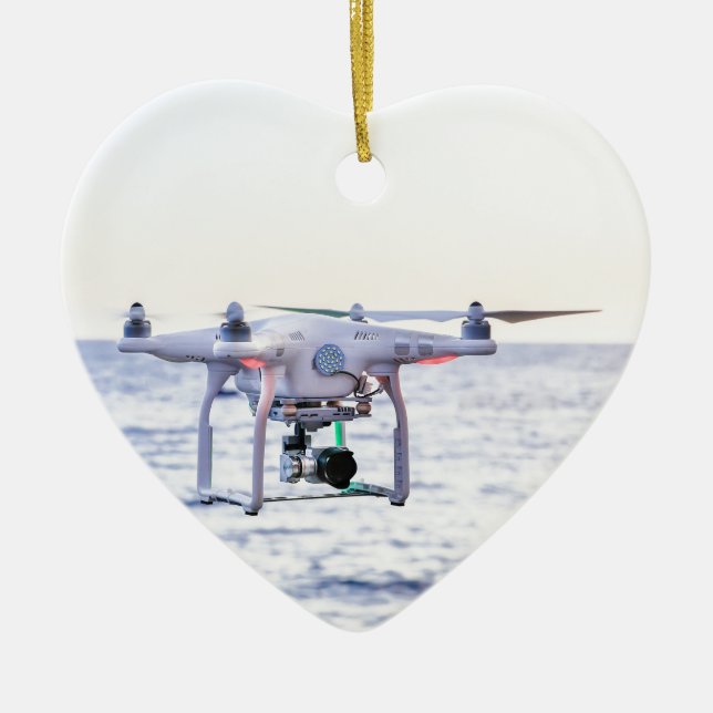 Flying drone at coast above sea ceramic ornament (Front)