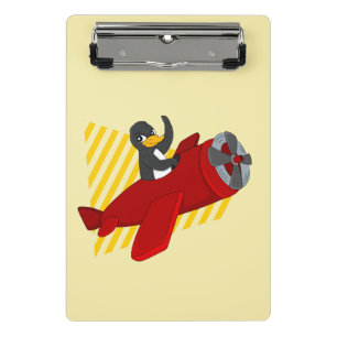 Flying penguin cartoon mini clipboard