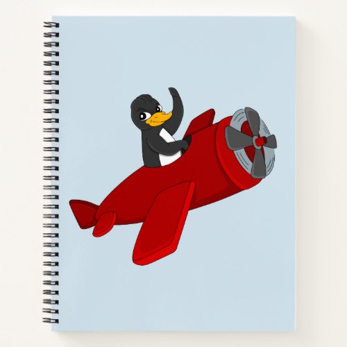 Flying penguin cartoon notebook