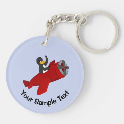 Flying penguin keychain