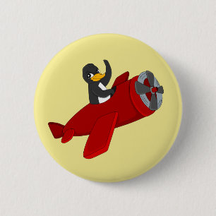 Flying penguing cartoon button
