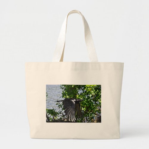 Flying Raven in Sunlight Wildlife Photo Large Tote Bag