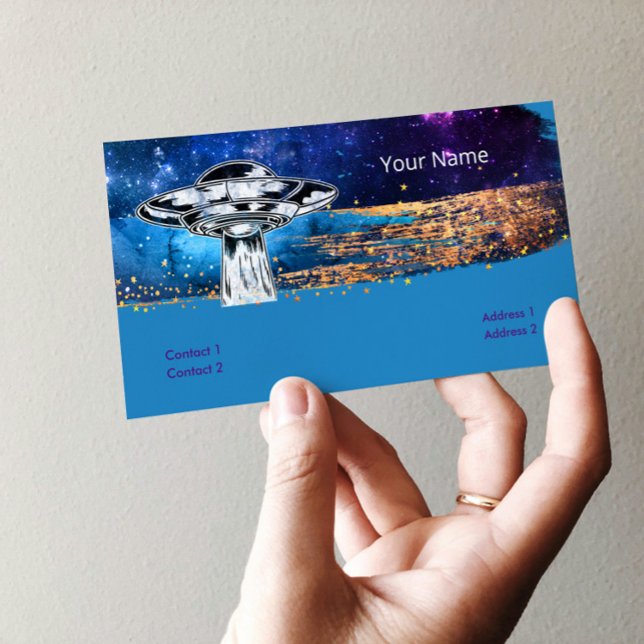 Flying saucer  in the artistic galaxy business card (Creator Uploaded)