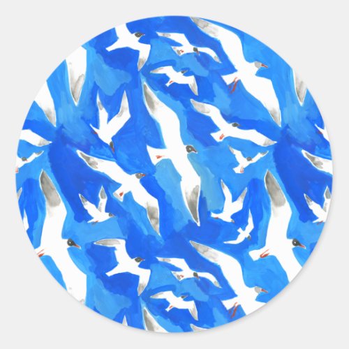 Flying seagulls on sky blue classic round sticker