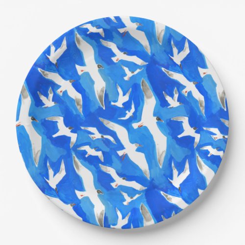 Flying seagulls on sky blue paper plates