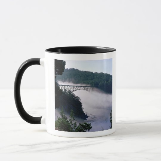 Fog drifts under the Deception Pass bridge at Mug