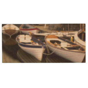 Fog surrounds four boats docked. wood USB flash drive