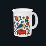 Folk Art Bird Floral Beverage Pitcher<br><div class="desc">Bring a touch of folk charm to your table with this ceramic beverage pitcher featuring a beautifully illustrated blue and yellow bird surrounded by colorful wildflowers. The vibrant, vintage-inspired design makes it perfect for serving lemonade, tea, or simply displaying as a decorative accent in your cottagecore or farmhouse kitchen. A...</div>