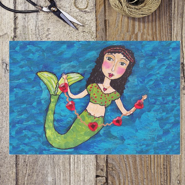 Folk Art Green Mermaid String of Red Hearts Tissue Paper (Green tailed mermaid holding string of red hearts on shades of blue wrapping tissue paper.)