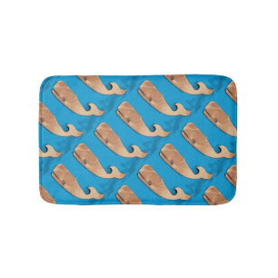 folk art whales on blue bathroom mat
