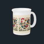 Folk Patchwork Rooster with Floral Accents Beverage Pitcher<br><div class="desc">This delightful folk art rooster brings together the warmth of vintage quilting with the charm of country living. Crafted in a playful patchwork style, each feather is adorned with floral motifs, checkered textures, and retro-inspired patterns that evoke a cozy, handmade feel. Surrounded by blooming flowers and leafy sprigs, this whimsical...</div>