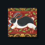 Folk Rabbit Canvas Print<br><div class="desc">Get this modern piece of artwork today with a brown and red background. This piece of art contains a black and white rabbit which appears to be running. The details in this image are very sharp and vivid. It's a contemporary art piece that will be perfect for any type of...</div>