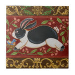 Folk Rabbit Tile<br><div class="desc">Get this modern piece of artwork today with a brown and red background. This piece of art contains a black and white rabbit which appears to be running. The details in this image are very sharp and vivid. It's a contemporary art piece that will be perfect for any type of...</div>