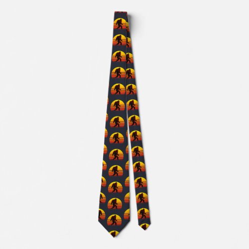 Folklore creature Bigfoot with a setting sun Neck Tie