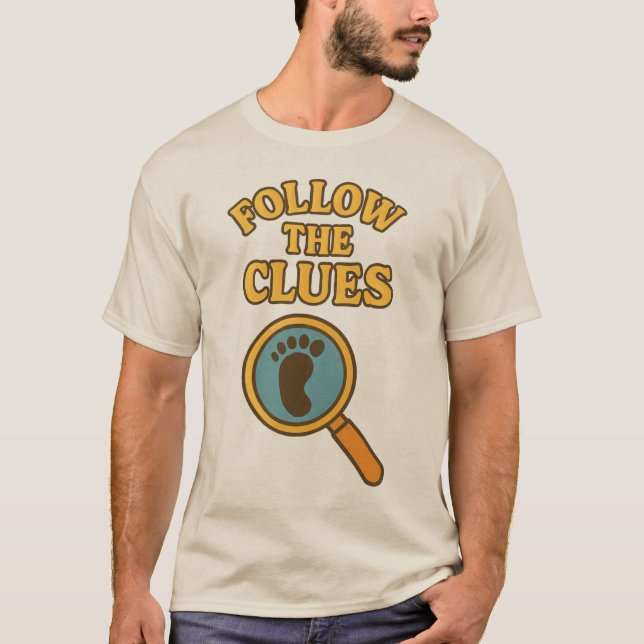 “Follow the Clues” T-Shirt (Front)