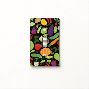 Food on a black background light switch cover