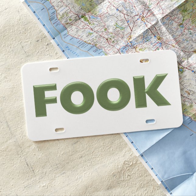 Fook green white plastic car license plate (In Situ)