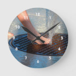 foot in water fountain round clock