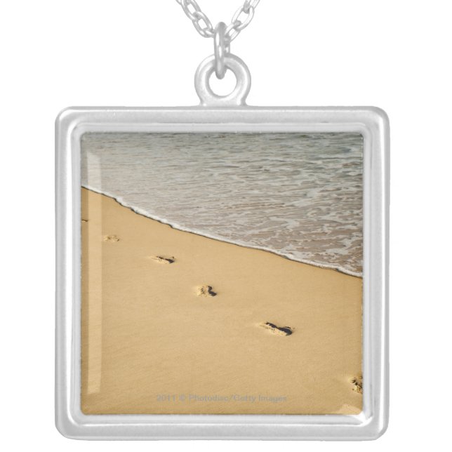 Foot prints in Sand with Wave Silver Plated Necklace (Front)