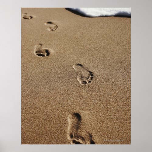 Foot steps in sand poster