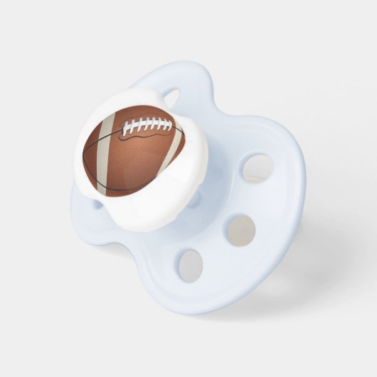 Football on a Baby Pacifier (Front Right)