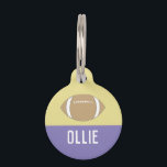 FOOTBALL (PURPLE) PET ID TAG<br><div class="desc">For the football enthusiast pet and their sports-loving owner, the Football Pet ID Tag in purple adds a splash of team spirit to your pet's collar. The rich purple and muted gold color palette evokes the pride of a school team or a hometown favorite, perfect for the pet who's always...</div>