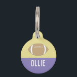 FOOTBALL (PURPLE) PET ID TAG<br><div class="desc">For the football enthusiast pet and their sports-loving owner, the Football Pet ID Tag in purple adds a splash of team spirit to your pet's collar. The rich purple and muted gold color palette evokes the pride of a school team or a hometown favorite, perfect for the pet who's always...</div>