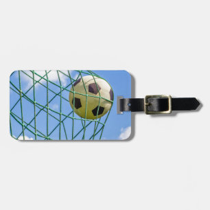 Football shot in goal net luggage tag
