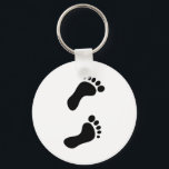 Footprints Keychain<br><div class="desc">Simple solid black graphic of a pair of human foot prints. Customize and choose your own background colour. Image available on various gifts and products.</div>